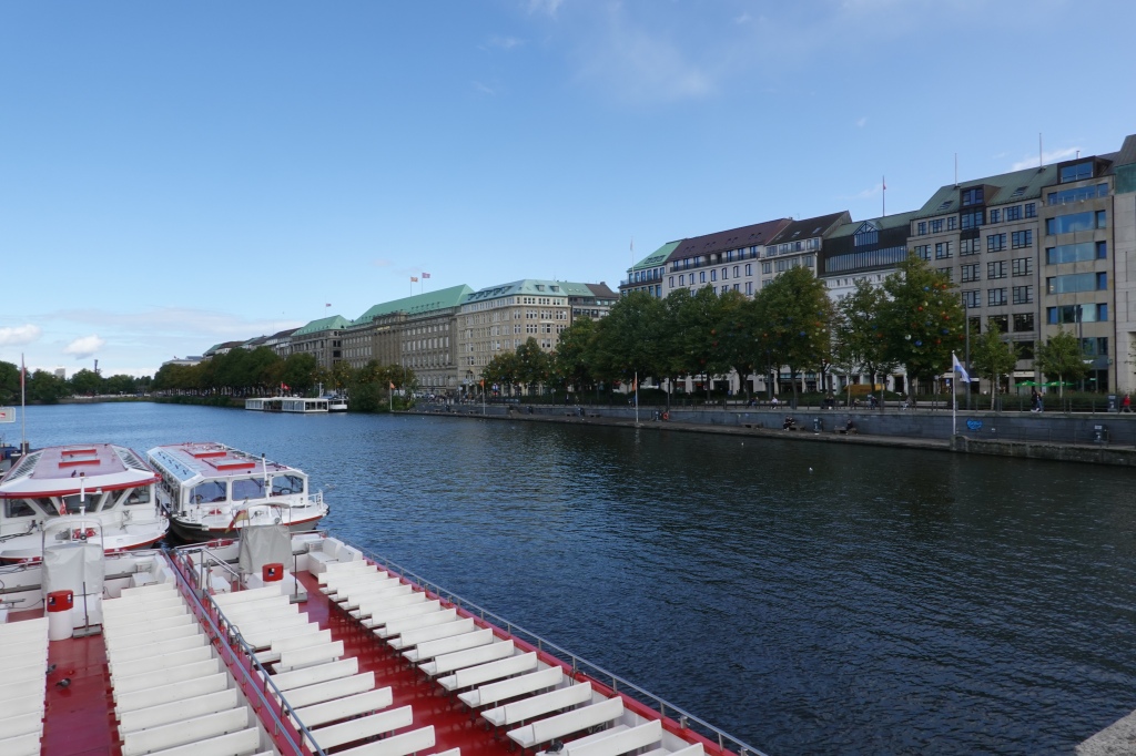 View of tourist boats waiting to depart on Alster Lake, Hamburg, Germany
